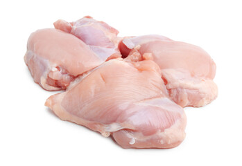 Many raw chicken thighs isolated on white