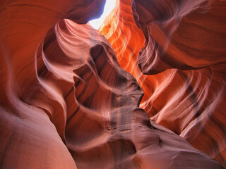 Explore the stunning sandstone canyon illuminated by vibrant light, perfect for adventure travel blogs or nature documentary promotions inspiring wanderlust