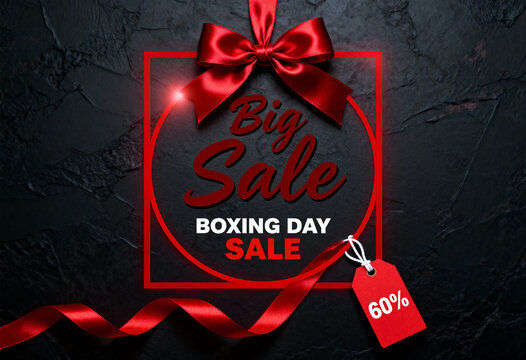 Boxing day big sale celebration poster with red ribbon, a discount tag, and text on dark textured background - Powered by Adobe