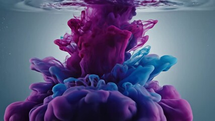 Colorful ink drop in water in slow motion. Abstract background of purple and blue paint mixing. Fluid art and creative concept - Powered by Adobe