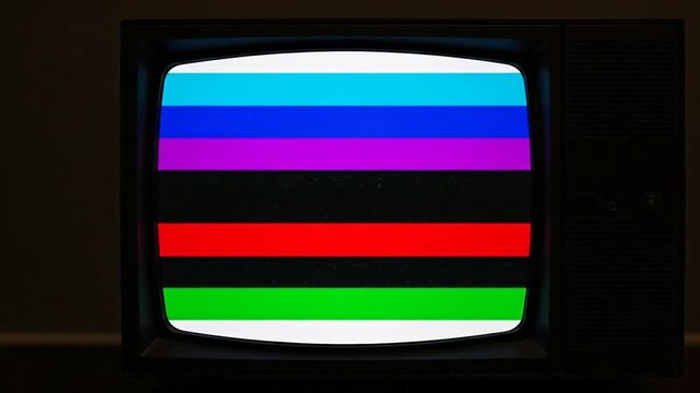 Color Bars on Classic Television: A vintage television displays a vibrant color bars pattern, evoking nostalgia for the golden age of television and broadcasting.