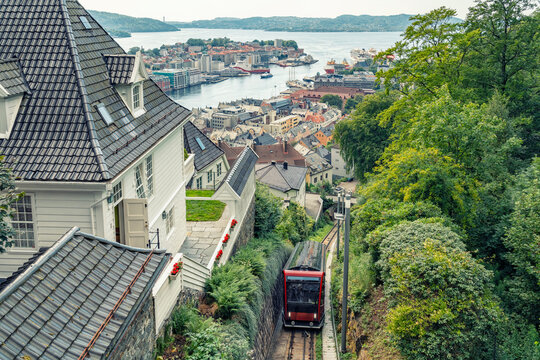 Funicular climbing hillside with panoramic cityscape of Bergen Norway