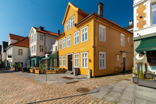 Historic wooden houses in old town of Bergen Norway on a sunny day - Powered by Adobe