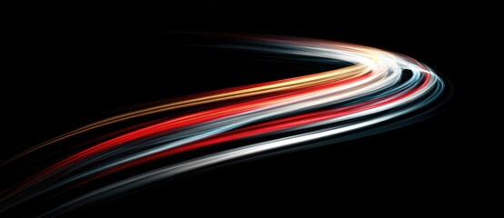 Light trails create dynamic motion in dark space