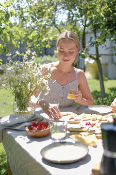Breakfast celebration outdoors with family values and togetherness