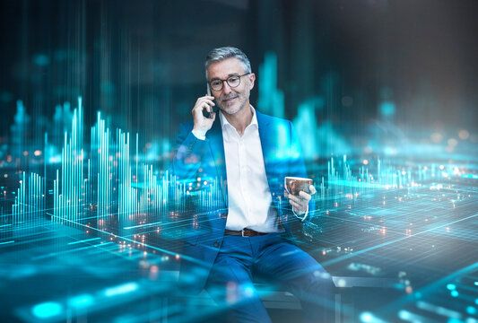 Engineer analyzing data on tablet with digital interface in server room