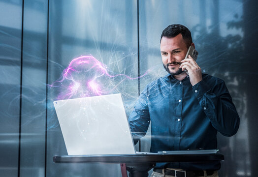 Engineer analyzing data on a notebook with AI visualization in server room