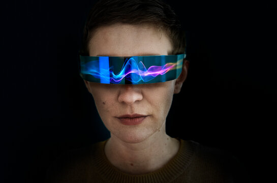 Engineer wearing futuristic AI glasses in a technology portrait