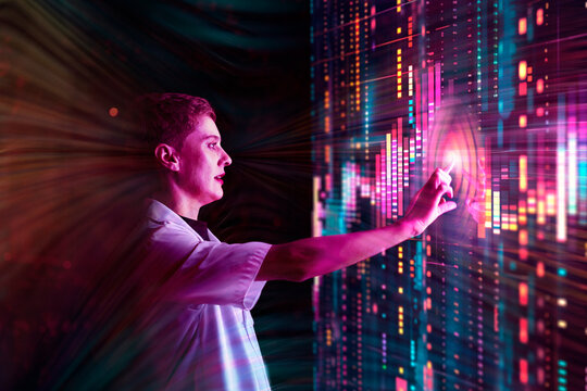 Engineer analyzing data on digital screen in modern server room