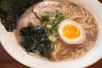 Delicious tonkotsu ramen bowl with delicious char siu above.