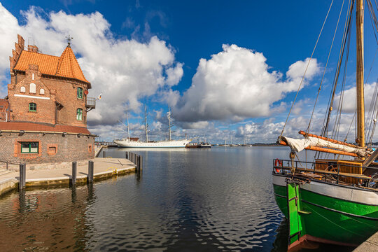 Harbor view with historic pilothouse and Gorch Fock 1 in Stralsund