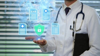 Doctor presents cybersecurity icon with electronic health (EHR) and medical records (EMR). Protection in digital healthcare. Digitalization in medicine