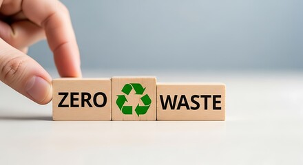 Hand arranging wooden blocks with zero waste recycling symbol, promoting sustainability and environmental responsibility concept