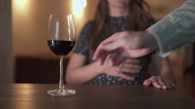 Unknown pregnant woman is refusing wine. Sober lifestyle