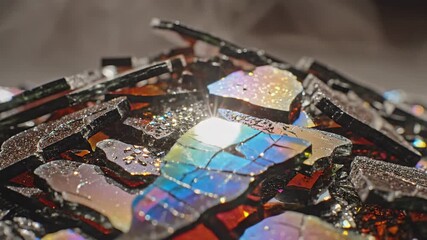 Close Up Shot of Iridescent Glass Fragments in Bright Lighting Reflecting Light and Shadows - Powered by Adobe