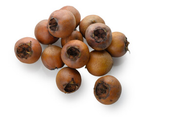 Ripe German Medlar Fruits on White Background