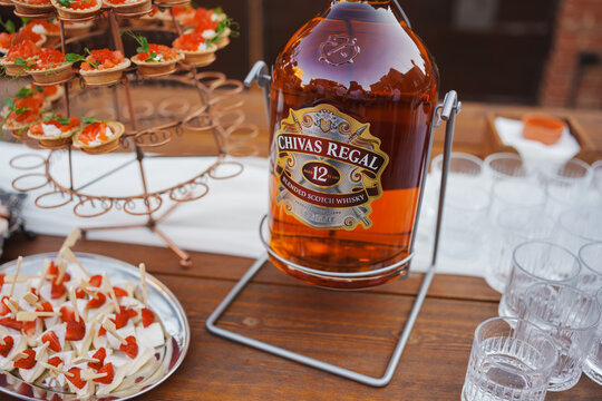 2025.09.03, Russia. Elegant setup for a whiskey tasting event with appetizers