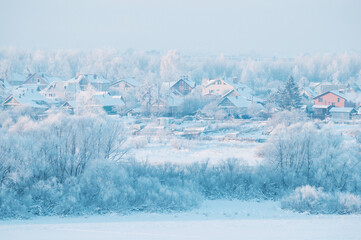 Birds eye view of countryside huts in winter, peaceful and quiet winter landscape rural scene,...