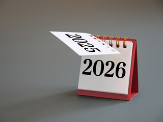 turning calendar page from 2025 to 2026, New Year calendar concept. desk calendar flip page for new year celebration