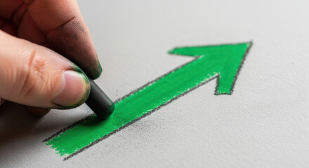 Hand drawing green arrow upward showing positive growth. great esg business and financial investment trend for future success and positive economic progress chart