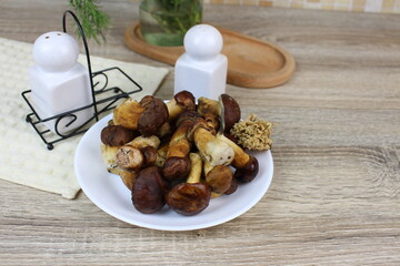 Wild mushrooms on the kitchen table waiting to be cooked