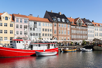 Nyhavn harbor in Copenhagen on a sunny day.