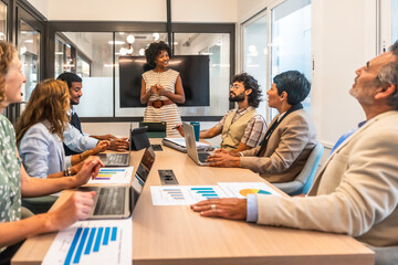 Diverse business team collaborating during a corporate meeting