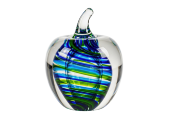 Isolated glass apple with swirled green and blue patterns in a clear round design object