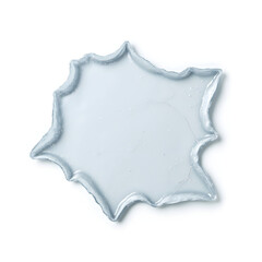 Isolated cracked frozen puddle fragment on pure white background, nature's beauty