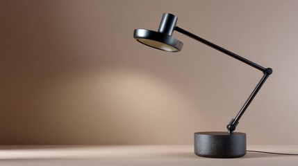 The minimalist black desk lamp stands elegantly on a wooden surface, its round base stabilizing the adjustable arm