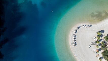 Aerial summer travel scene showing &Ouml;l&uuml;deniz Blue Lagoon&rsquo;s vivid turquoise sea