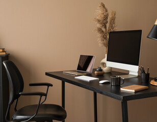 Sleek and Productive Modern Home Office Desk Setup Featuring Computer, Laptop, and Minimalist Decor Accents