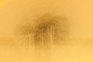 Distressed gold leaf texture with scratches