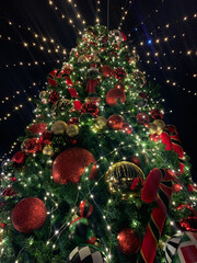 christmas tree with red lights and christmas decorations