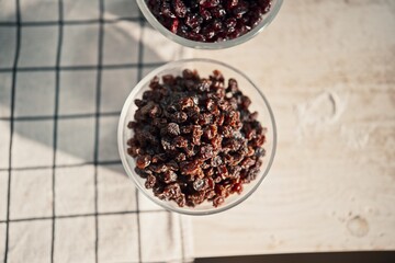 a jar full of cranberries raisins