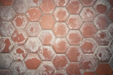 brown hexagon floor plates with white spots