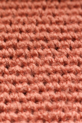 Macro detail of crochet fabric texture background. 