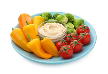 Different fresh vegetables and sauce isolated on white