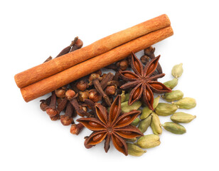Mulled wine spices. Cinnamon sticks, anise stars, cardamon seeds and cloves isolated on white, top...