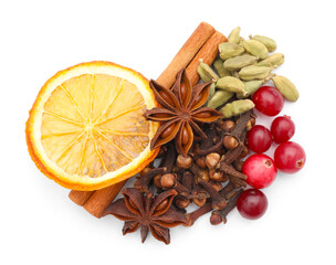 Different spices, cranberries and dry orange slice for mulled wine isolated on white, top view