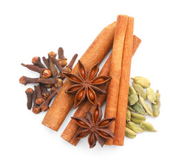 Mulled wine spices. Cinnamon sticks, anise stars, cardamon seeds and cloves isolated on white, top view