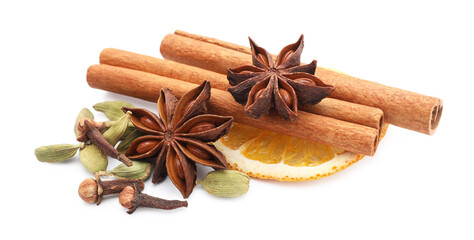 Different spices and dry orange slice for mulled wine isolated on white