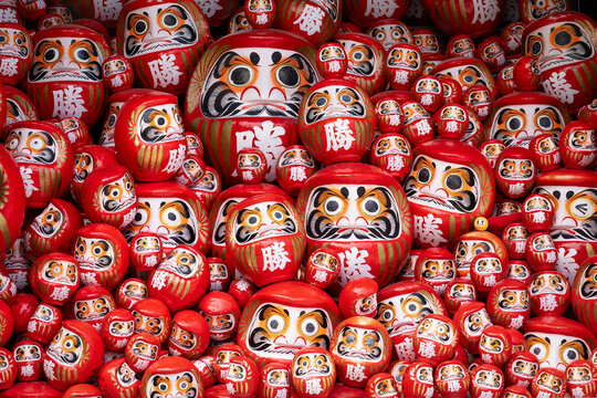 Detail of red daruma dolls at Katsuoji temple  in Japan