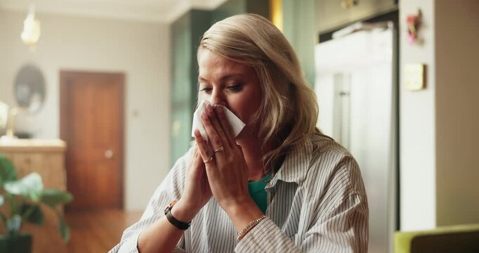 Woman, sneeze or blowing nose in home with tissue for influenza, health problem and virus symptoms. Sick person, allergies or illness in house with toilet paper for hayfever, cold or sinus infection.