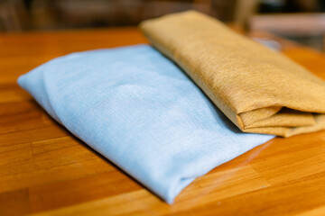 Elevate your space with calming blue and gold fabric textures that bring a touch of elegance and minimalist charm to any room's decor, perfect for home styling projects