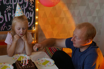 Young woman and man dancing playfully on a ship deck. Romantic couple on their wedding day,...
