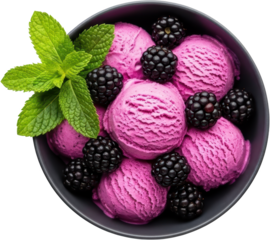 A top down view of a gray bowl filled with scoops of bright pink ice cream garnished with fresh blackberries and green mint leaves blackberry ice cream