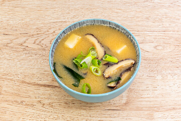 Japanese curry ramen with thick curry broth, karaage chicken, spinach, and a boiled egg on horrible noodles