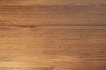 The peeling white paint on the wooden planks reveals previous layers of color, telling the material's chromatic history.