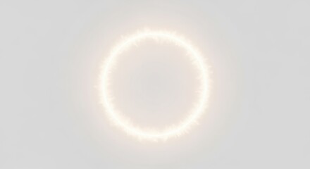 A stunning annular solar eclipse creating a brilliant ring of fire against a pale, hazy sky.